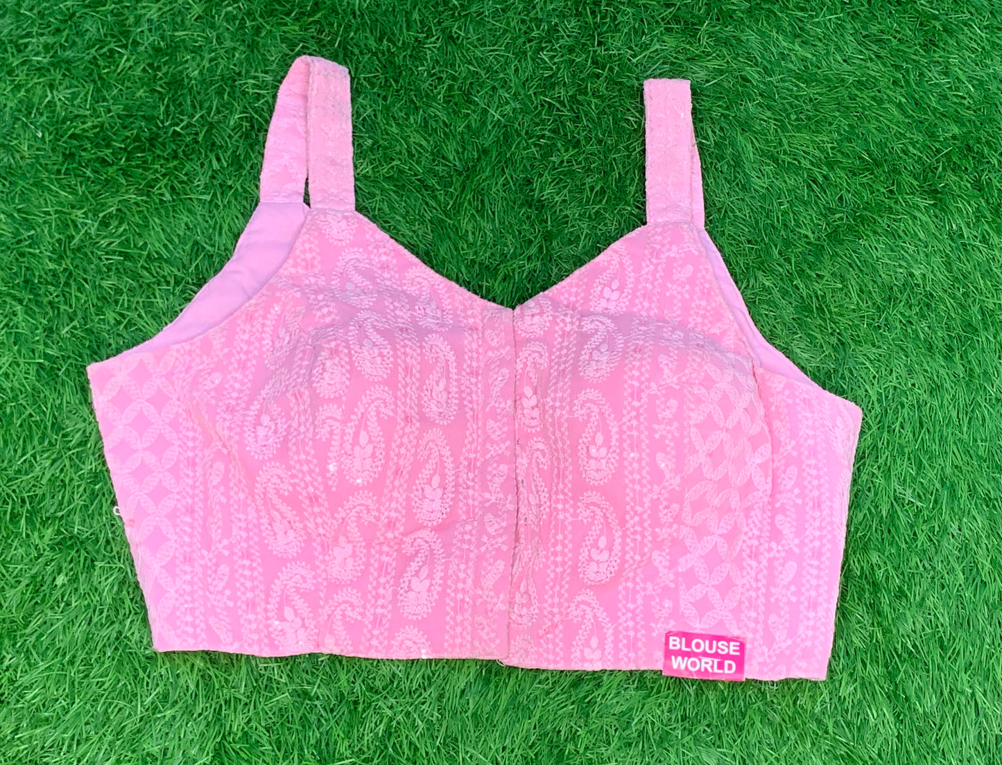 Sleeveless baby pink blouse