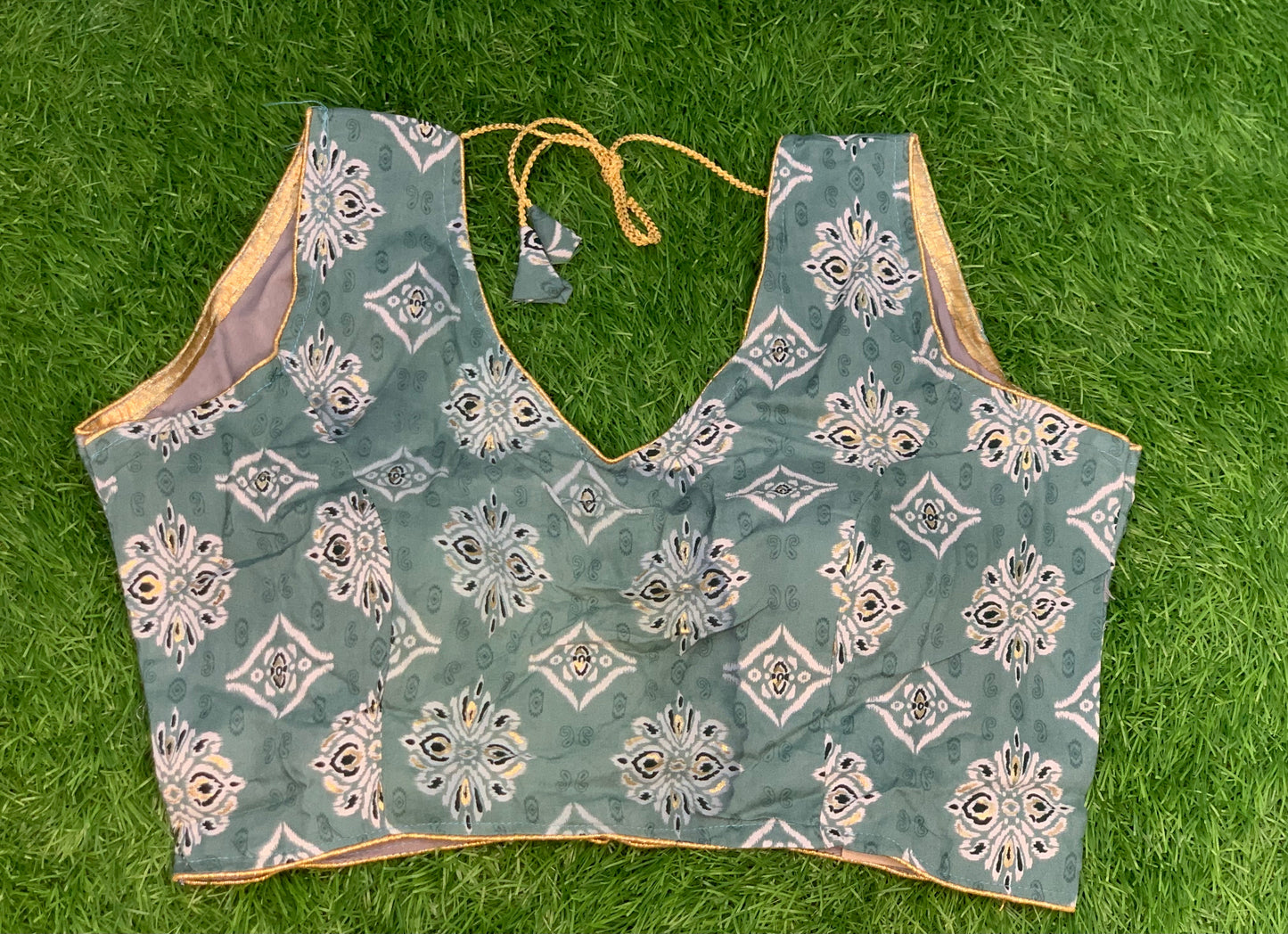 Mint colour sleeveless blouse