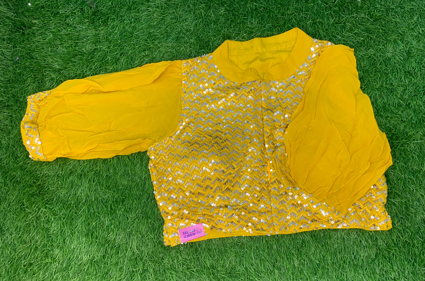 Yellow with silver sequence puff hands high front n back blouse