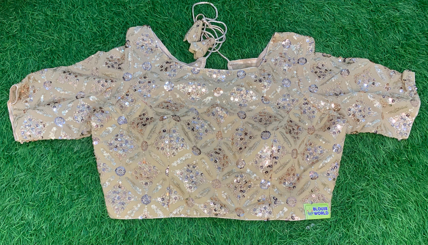 Golden blouse designer