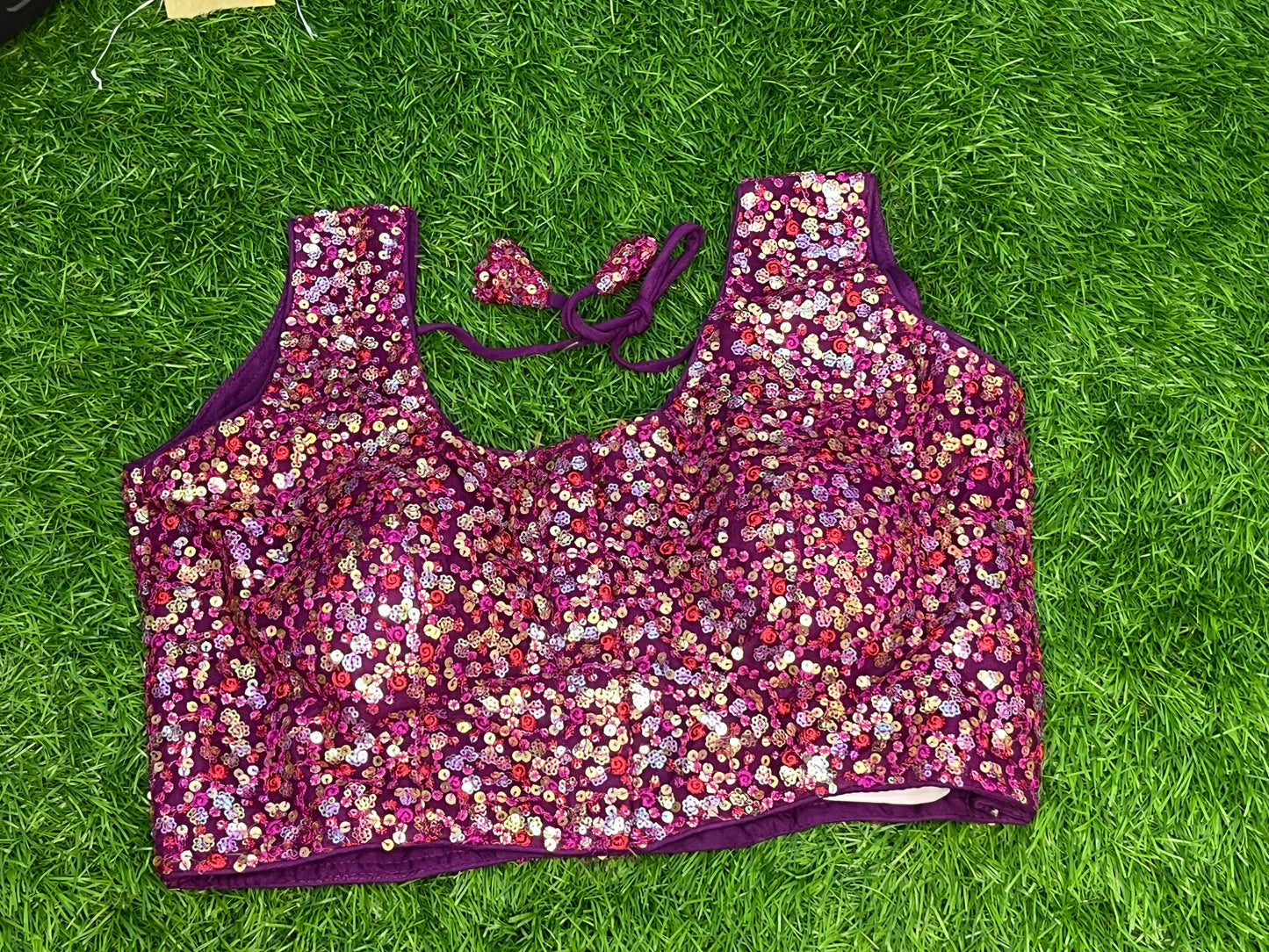 Purple sleeveless multicolour blouse