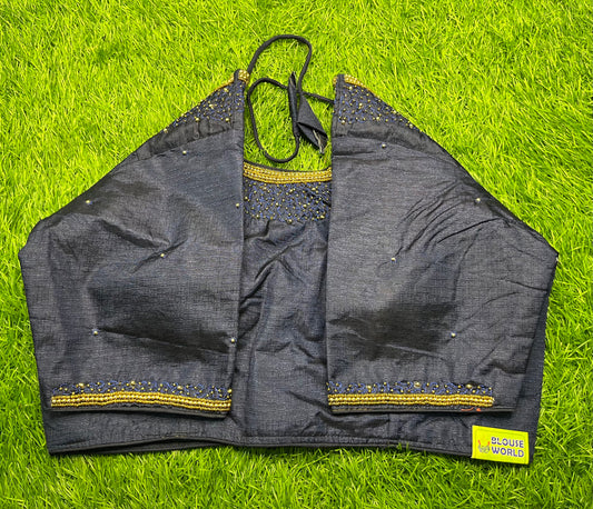 A common black colour with small stone work blouse 👚
