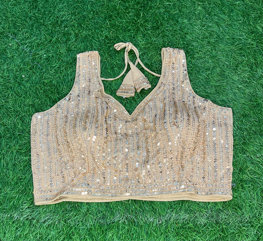 Golden blouse with hands