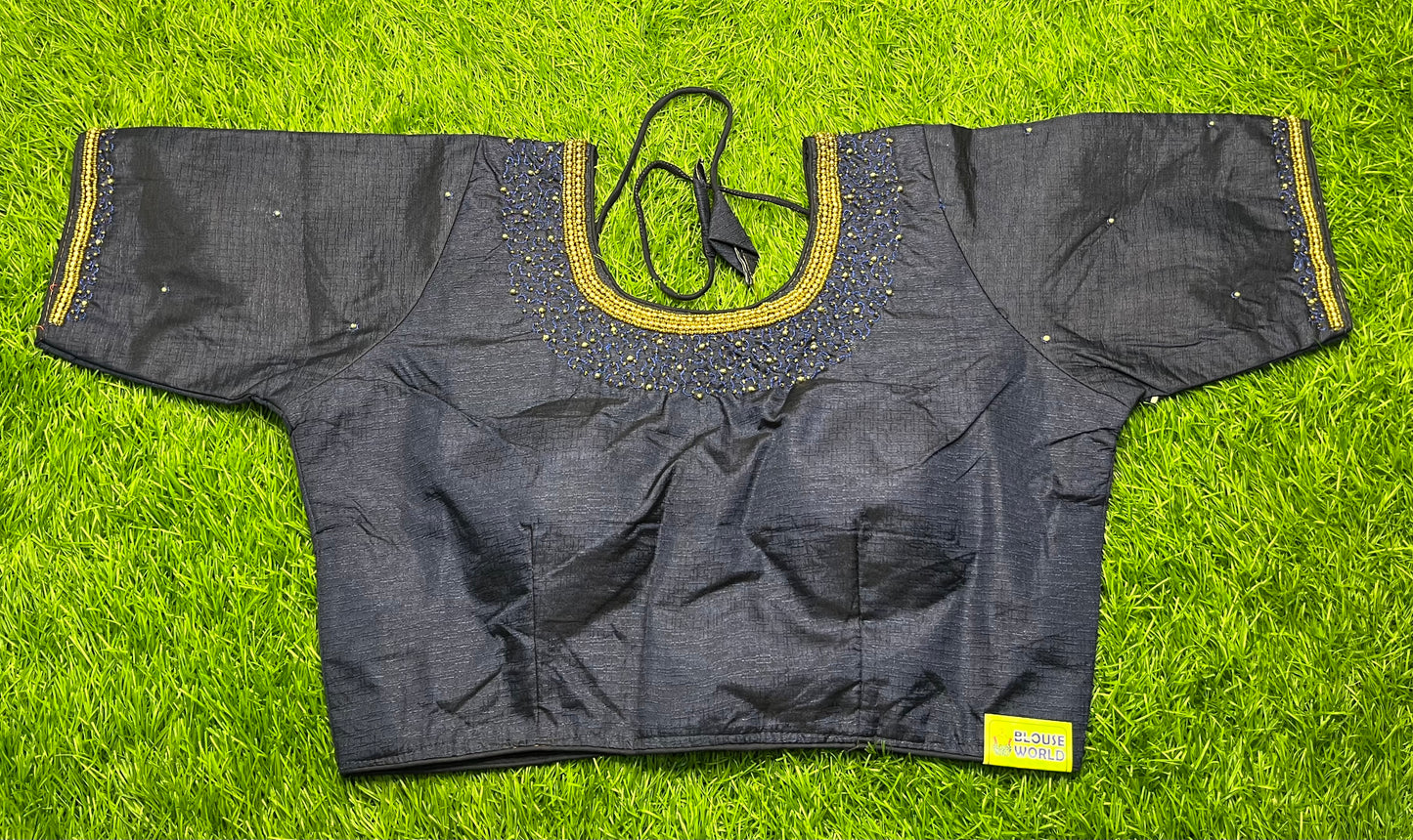 A common black colour with small stone work blouse 👚