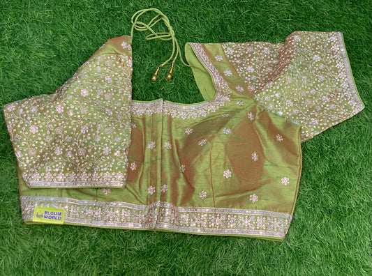 Green dual shade embroidery blouse with silver zari work