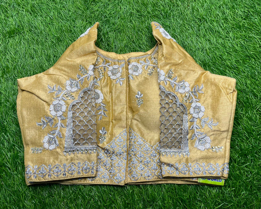 Golden base silver work cut work design blouse