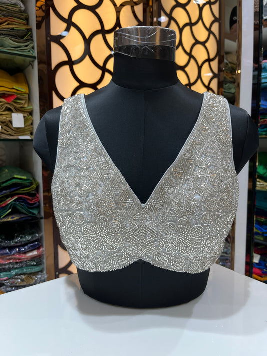 Whimsical Radiance: Floral & Pearl Embellished Corsets