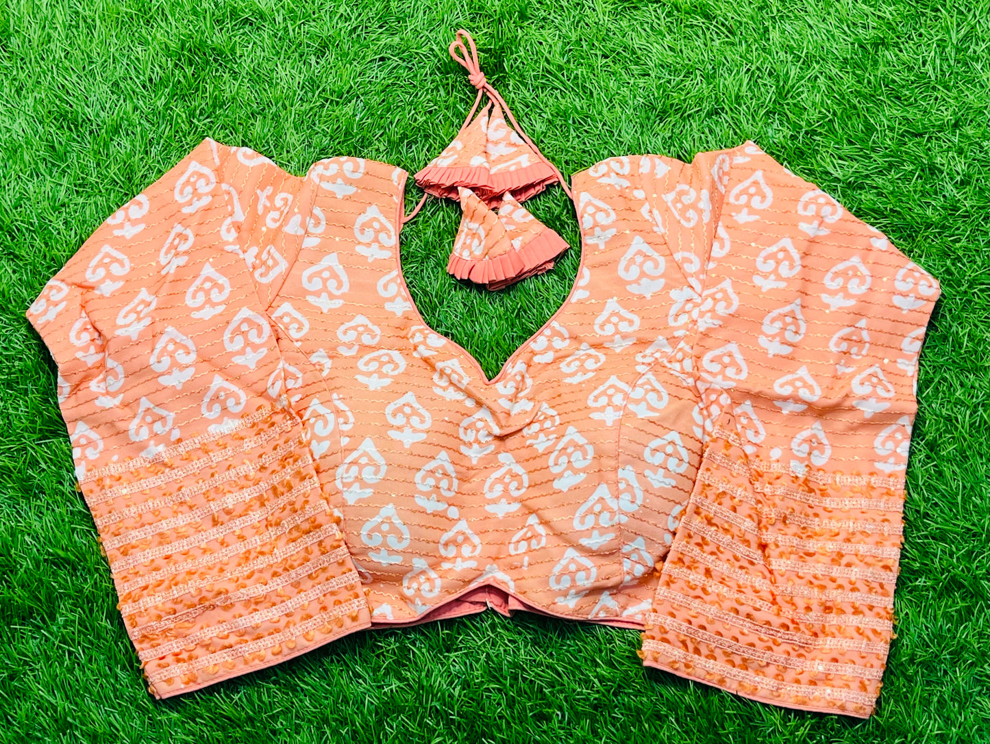Peach colour off white print full hands blouse