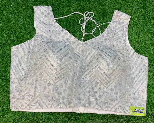 Embroidery sequence fancy sleeveless blouse