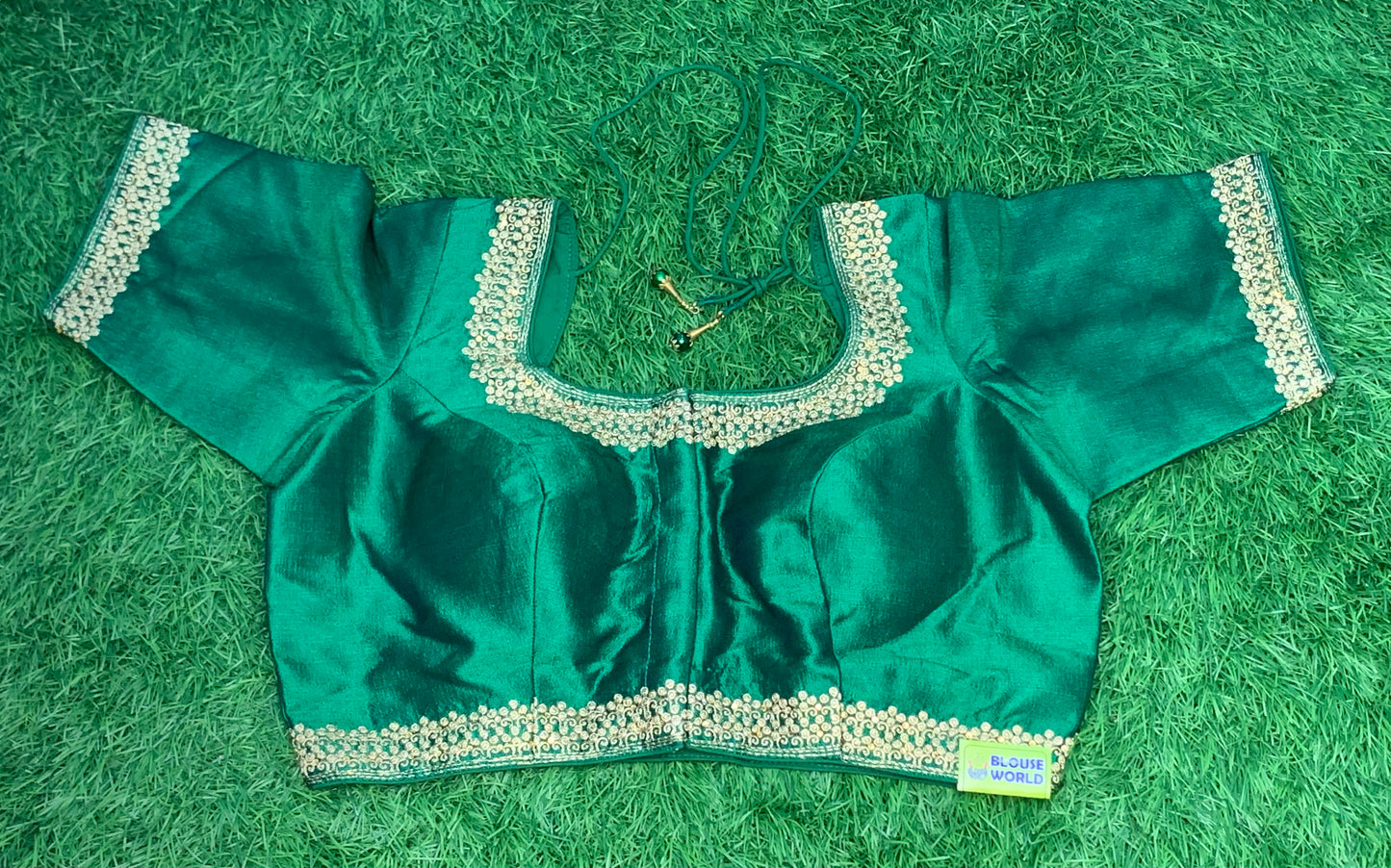 Bottle green gold zari blouse