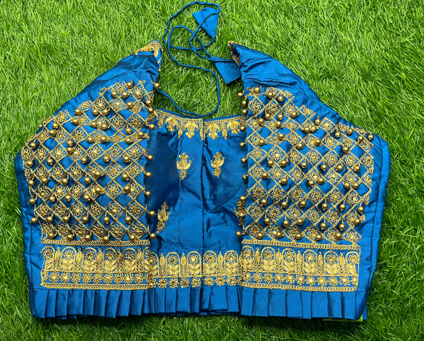 Fairoza blue with small golden hanging balls hands and waist with frills design