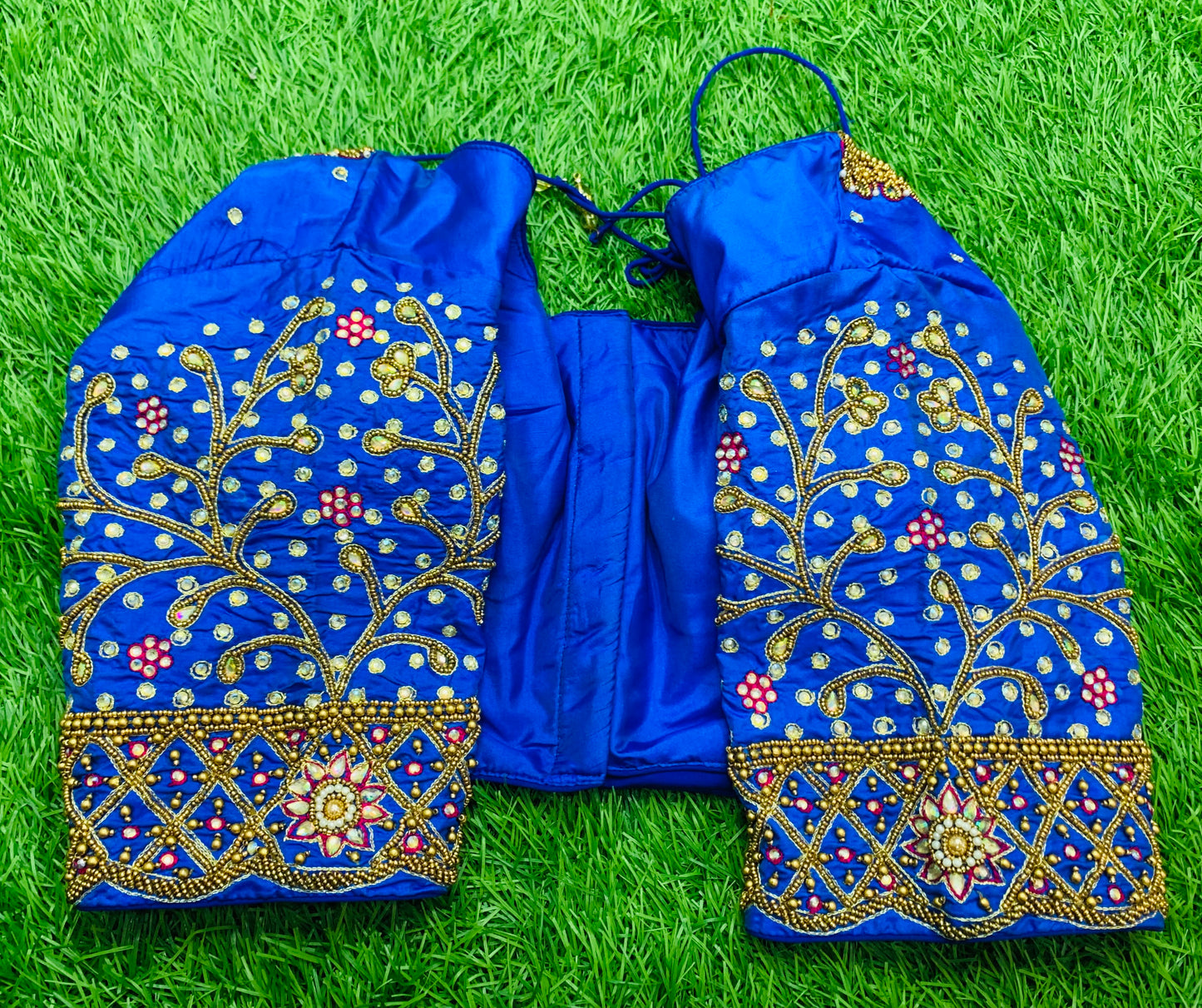 Sky blue maggam hand work with gold zari blouse