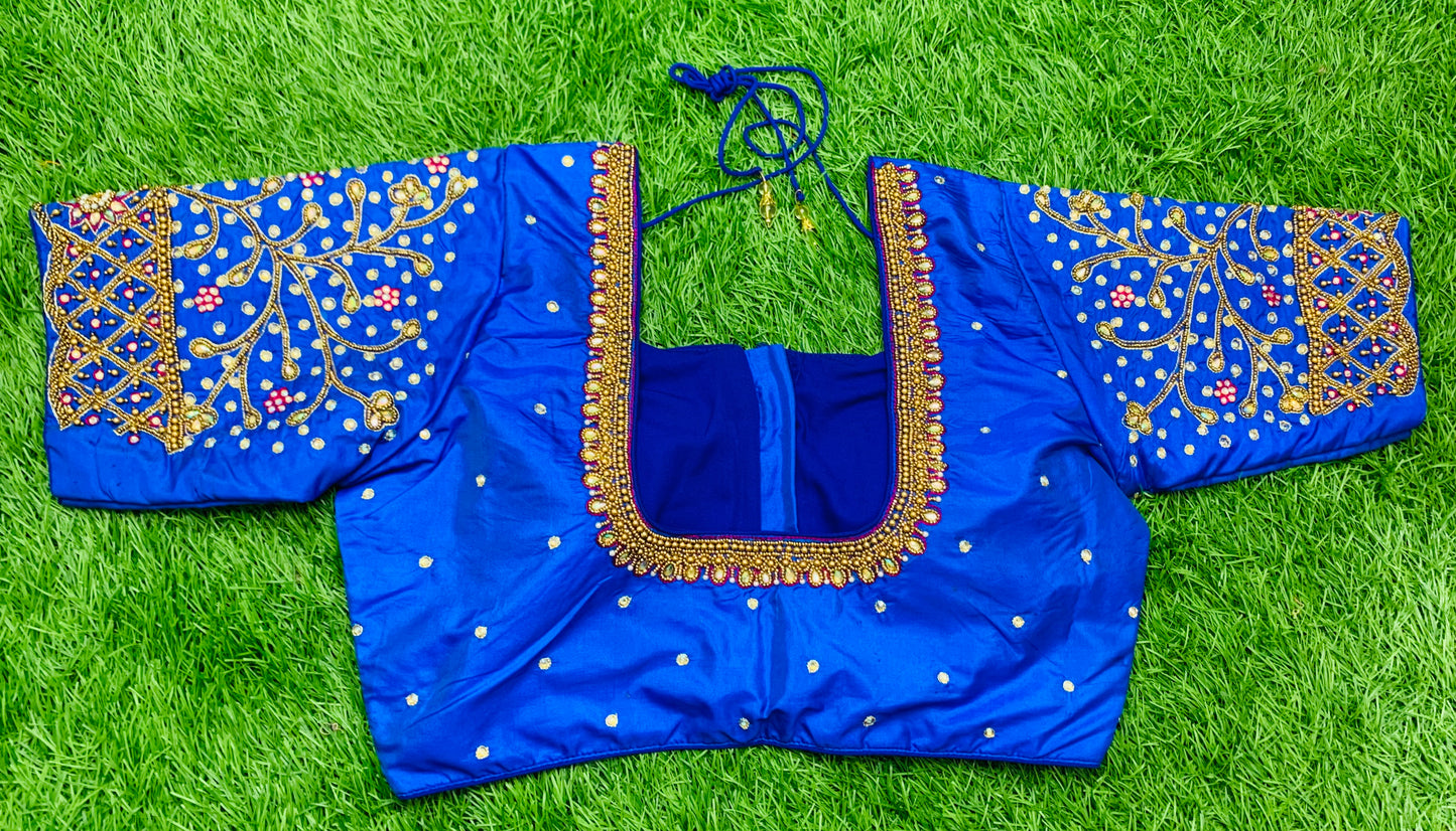 Sky blue maggam hand work with gold zari blouse