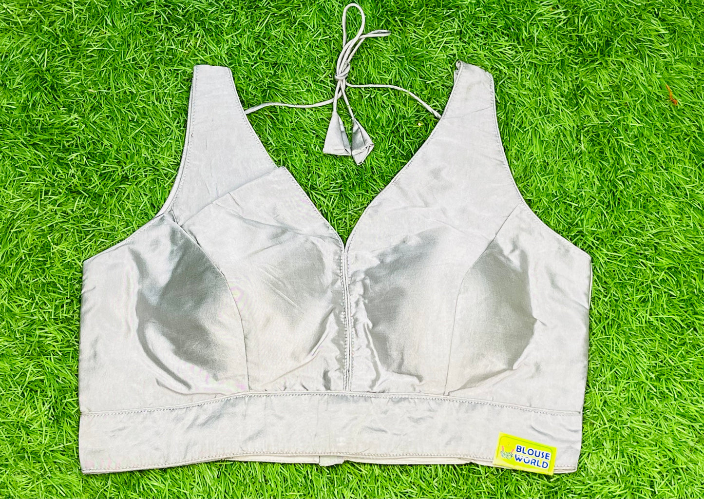 Grey colour v neck sleeveless blouse