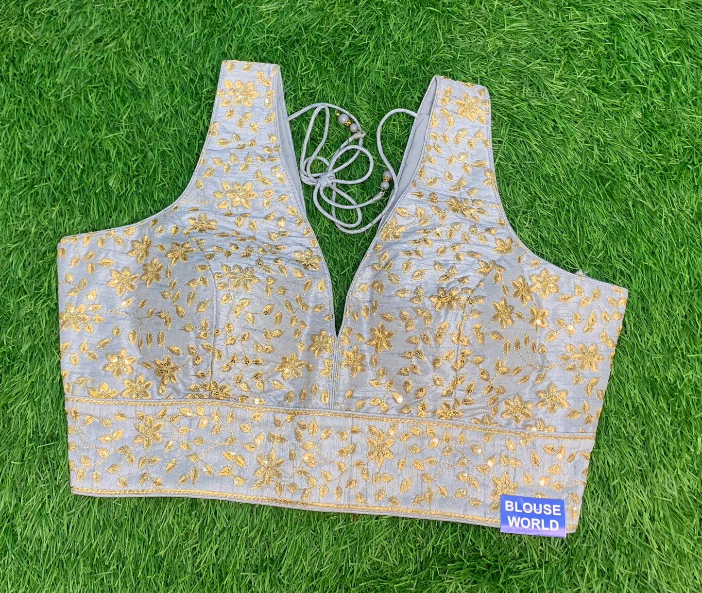 Grey with golden work sleeveless blouse