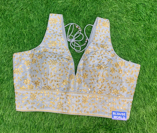 Grey with golden work sleeveless blouse