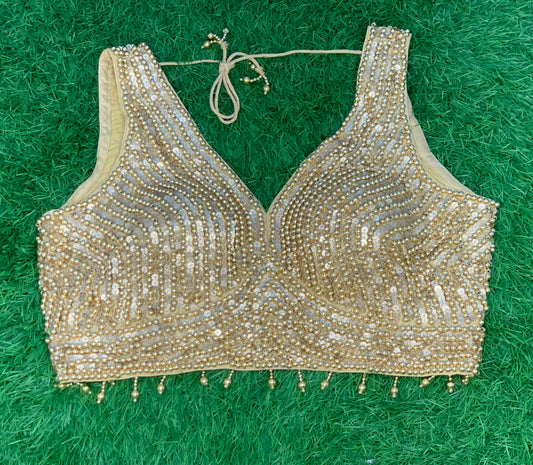 Pearl with sequence work sleeveless gold blouse