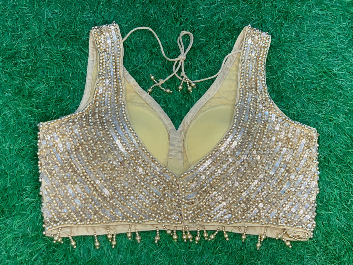 Pearl with sequence work sleeveless gold blouse