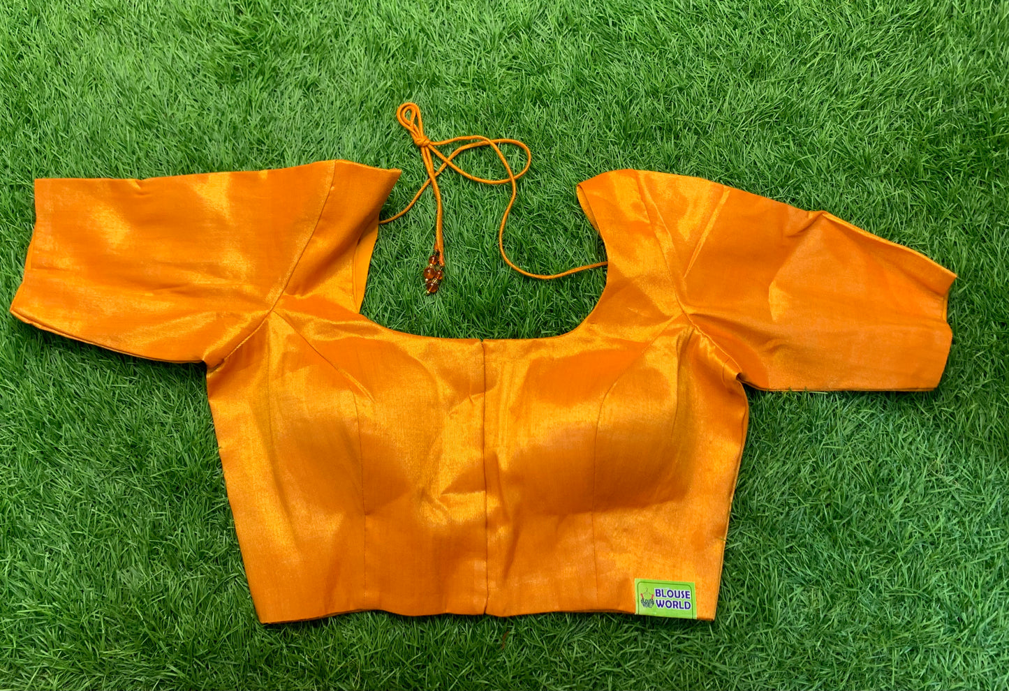 Orange 🍊 plain tissue blouse size 34 to 42