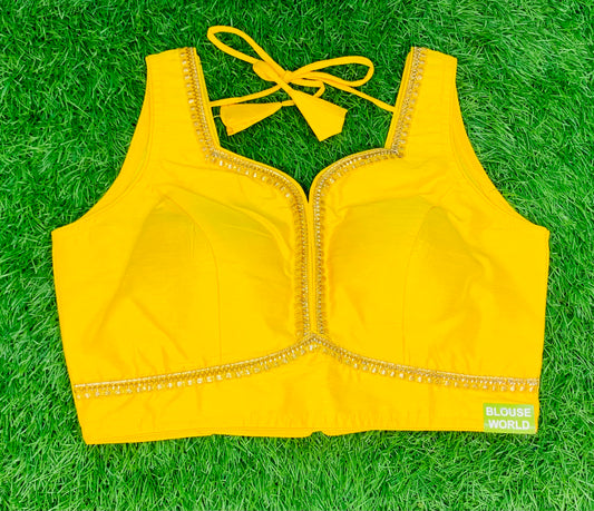 Bright yellow with golden zari blouse