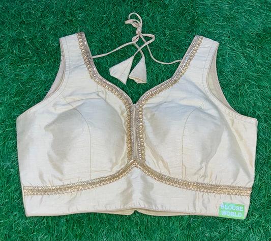Light gold with hands blouse
