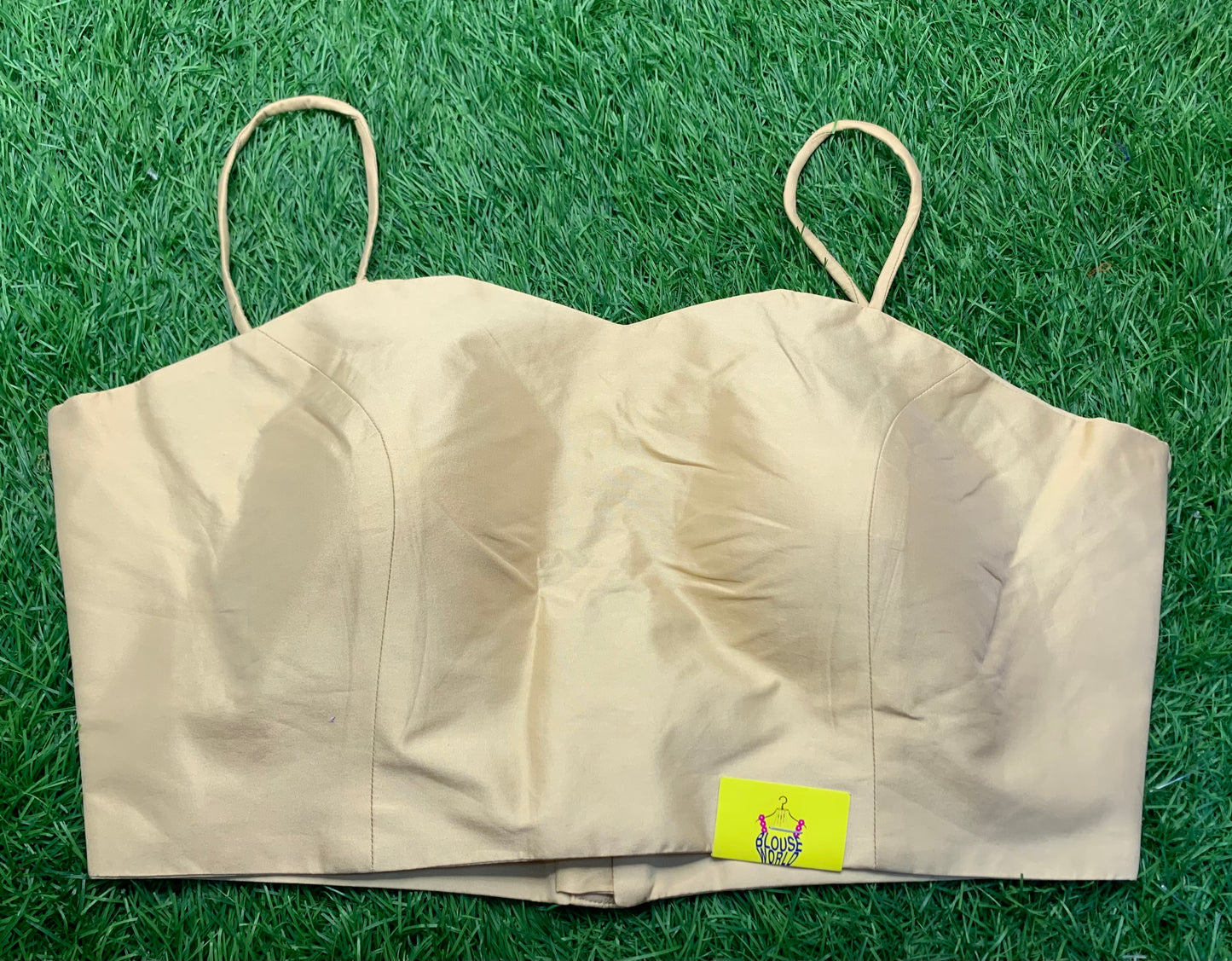Golden noodle strap sleeveless blouse